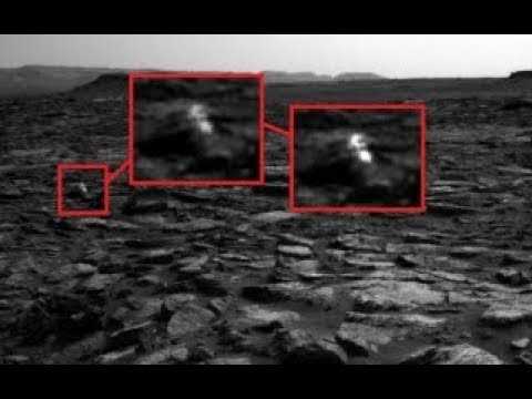 На НОВЫХ снимках с МАРСА обнаружили двух гуманоидов и разбитое НЛО.Тайны красной планеты